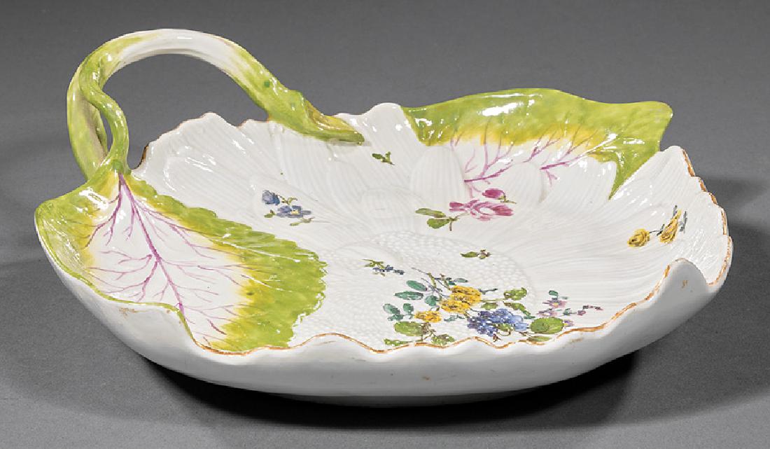 Meissen Molded Porcelain Leaf-Shaped Dish: Meissen Molded Porcelain Leaf-Shaped Dish, 18th/19th c., crossed swords mark, modeled as a chrysanthemum flanked by two leaves, Deutches Blumen decor, twisted stem handle. Provenance: The Sturm Collec