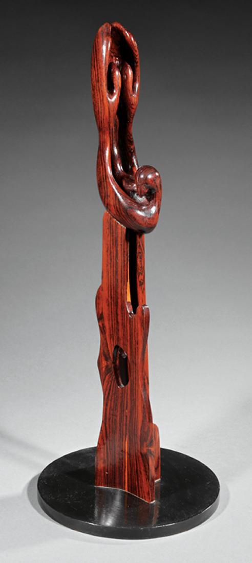 Domingo Calasaya (American/New Orleans, 20th c.): Domingo Calasaya (American/New Orleans, 20th c.), "Praying Hands", carved and stained wood on wood base, unsigned, h. 28 in., w. 6 in., d. 3 in. Provenance: Collection of Michael Brown and Linda Green