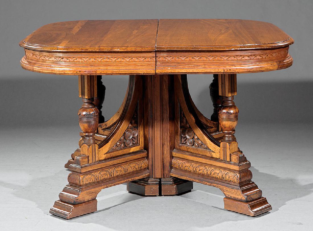Carved Walnut Dining Table attr. Brooks: Fine American Renaissance Carved Walnut Extension Dining Table, attr. to Thomas Brooks, New York, molded top, carved frieze, bracketed pedestal, vasiform supports, stepped base, block feet, opening to