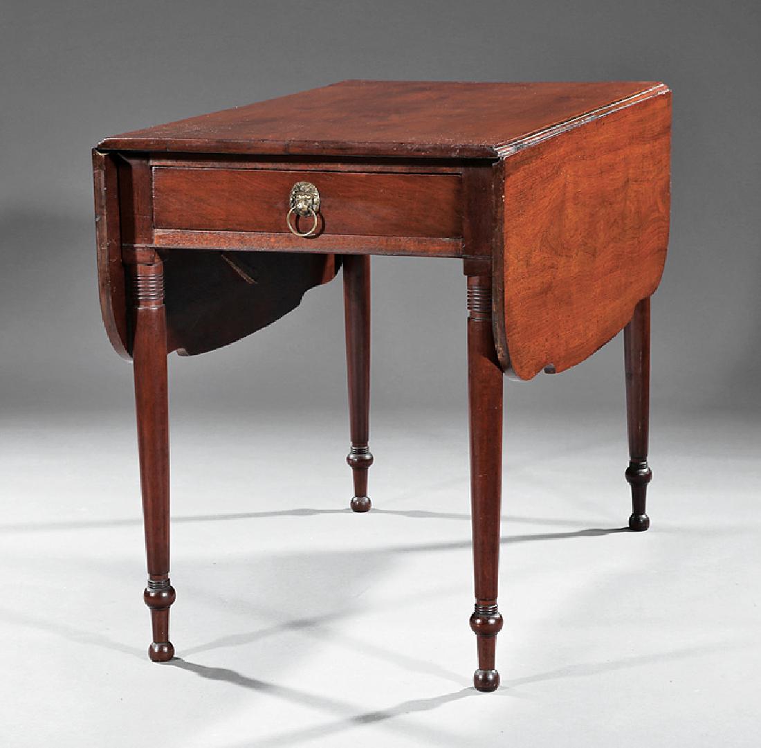 American Federal Carved Mahogany Drop-Leaf Table: American Federal Carved Mahogany Drop-Leaf Table, early 19th c., shaped drop leaves, frieze drawer, ring-turned tapered legs, button feet, h. 28 1/2 in., w. 38 1/2 in., d. 22 in