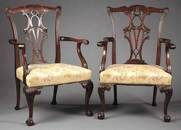 Fine Pair of George III Carved Mahogany Armchairs: A Fine Pair of George III Carved Mahogany Armchairs , mid-18th c., after designs of Thomas Chippendale, each having acanthus carved scrolled ears, the finely carved and pierced splat with foliate cart
