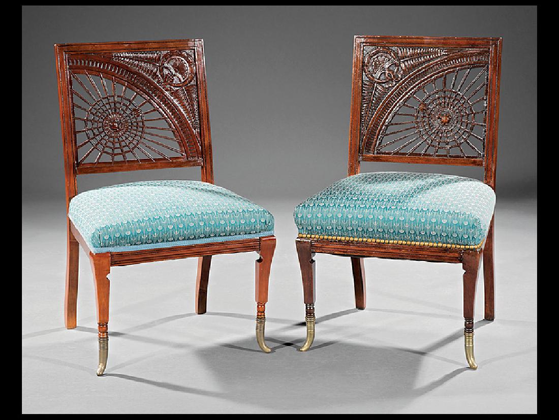 American Aesthetic Carved Mahogany Slipper Chairs: Pair of American Aesthetic Carved Mahogany Slipper Chairs, c. 1885, possibly Ohio, reticulated spider web motif back, incised seat rail, tapered legs, flared brass cuff feet, h. 31 in., w. 18 1/2 in.,
