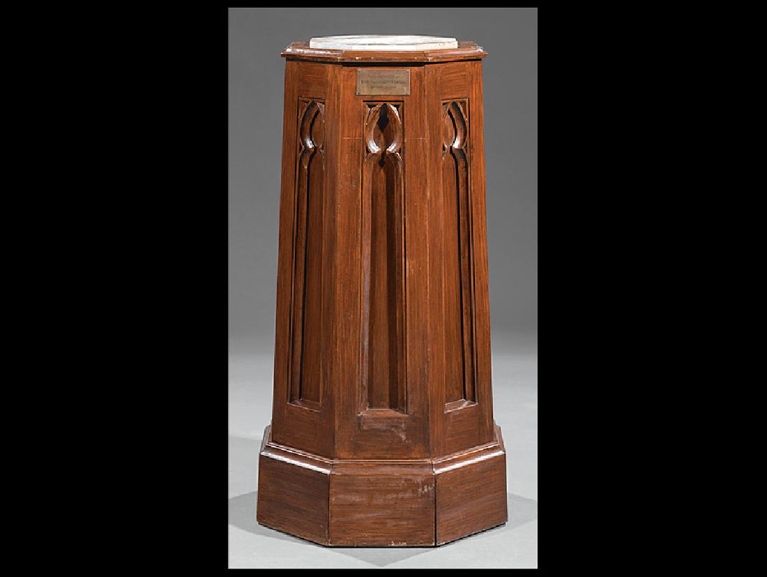 American Gothic Carved Mahogany Pedestal: Antique American Gothic Carved Mahogany Pedestal, tapered octagonal form, inset granite top, plaque inscribed "presented in honor of Evva M. and Robert P. Wetzel by their children", h. 38 3/4 in., dia