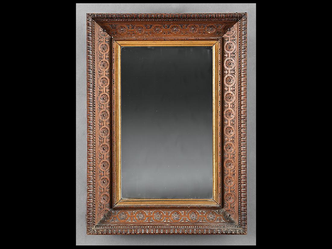 American Aesthetic Carved Walnut Mirror: American Aesthetic Carved Walnut Mirror, late 19th c., dentil and bead frame with foliate rosettes, gilt inner border