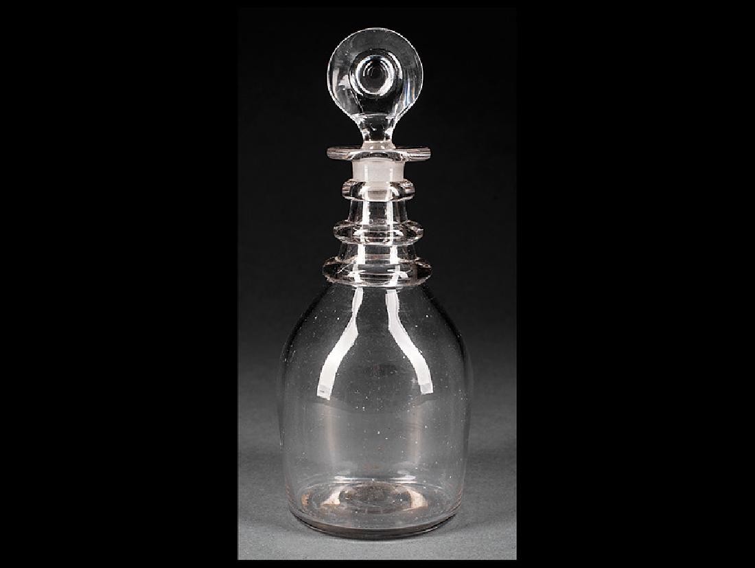 Four Crystal Decanters: Four Antique Crystal Decanters, incl. an early 19th c. Georgian decanter, English sherry decanter with spherical stopper, an Irish 19th c. brandy and another English decanter. Provenance: The Sturm Co