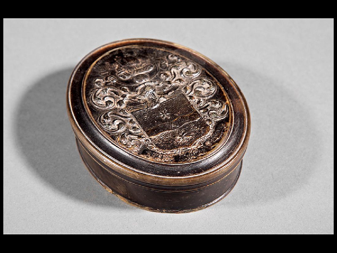 Queen Anne Pressed Horn Snuff Box: Queen Anne Pressed Horn Snuff Box, c. 1712, arms and name of Sir Francis Drake and the ships of his voyage, bears Christie's label 2/5/02, h. 1 1/4 in., w. 3 1/4 in., d. 4 in. Ref.: Le Corbeiller, Cla
