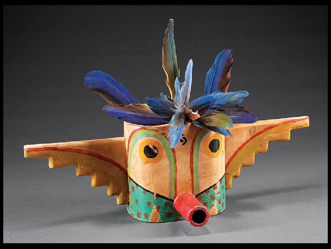 Gregory Lomayesva (American/Santa Fe, b. 1971): Gregory Lomayesva (American/Santa Fe, b. 1971), "Untitled (Kachina Mask)", 2001, carved and painted wood with feathers, signed and dated en verso, h. 14 1/2 in., w. 22 in., d. 7 in. Provenance: Collec