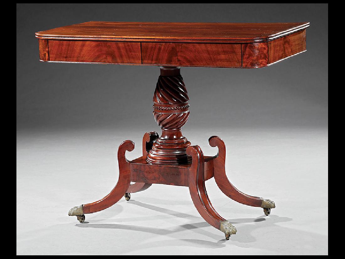 American Late Federal Carved Mahogany Side Table: American Late Federal Carved Mahogany Side Table, early 19th c., probably Philadelphia, molded top, conforming frieze, spiral reeded standard, square plinth, molded sabre legs, brass paw feet, casters