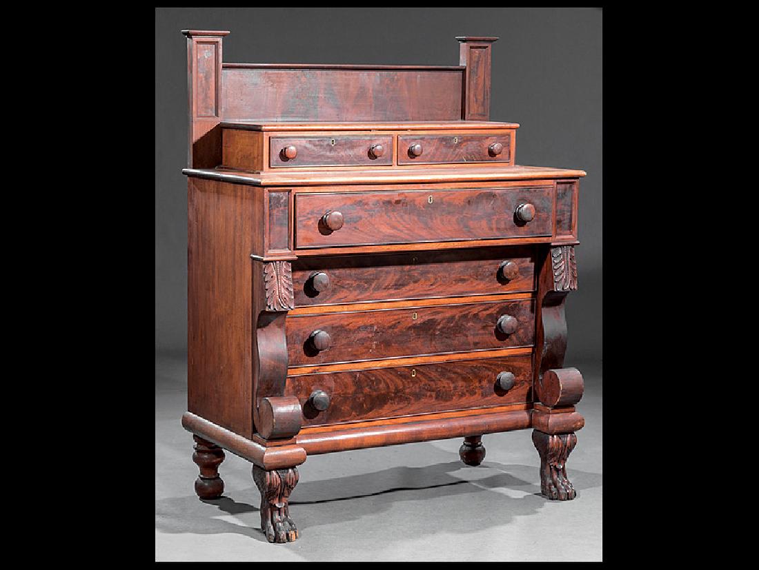 Carved Mahogany Gentleman's Dresser: American Late Classical Carved Mahogany Gentleman's Dresser, c. 1830, paneled superstructure with two glove drawers, outset frieze drawer ove three graduated drawers, exuberant foliate-carved scrolled