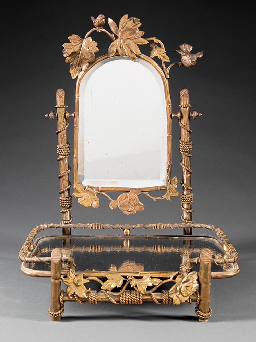 Beaux Arts Brass Dressing Mirror: Beaux Arts Brass Dressing Mirror, c. 1900, branch-form frame, surmounted by leaves and birds, on conforming mirrored table, h. 19 in., w. 13 3/4 in., d. 11 in