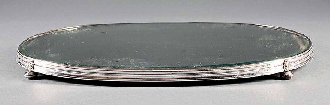 Antique Silverplate Mirrored Plateau: Antique Silverplate Mirrored Plateau, 19th c., oval beveled mirror plate, reeded surround, suppressed ball feet with acanthus brackets, 20 5/8 in. x 14 5/8 in