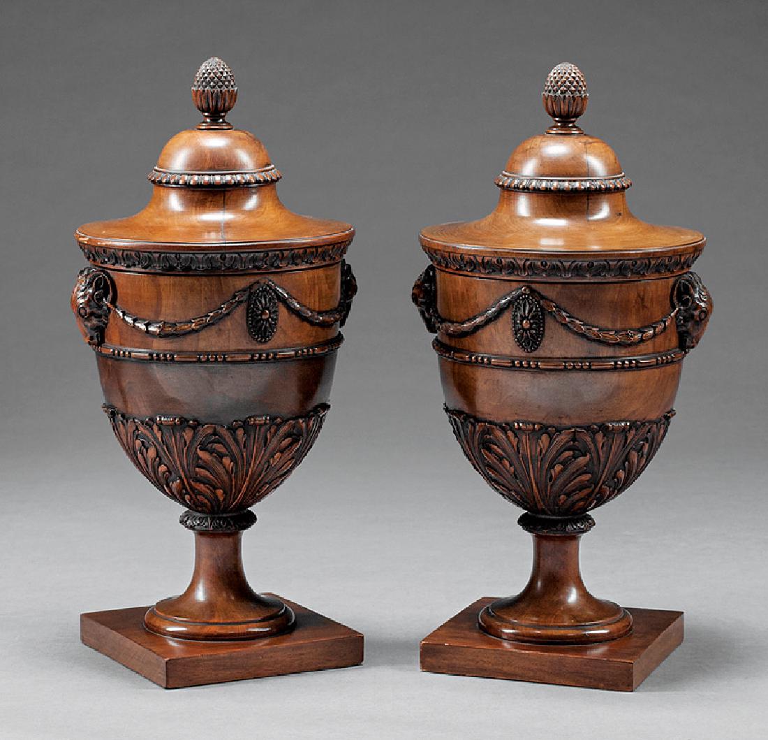 Pair of Edwardian Carved Mahogany Cutlery Urns: Pair of Edwardian Carved Mahogany Cutlery Urns, ram's head handles, void interior, h. 24 in., dia. 10 1/2 in