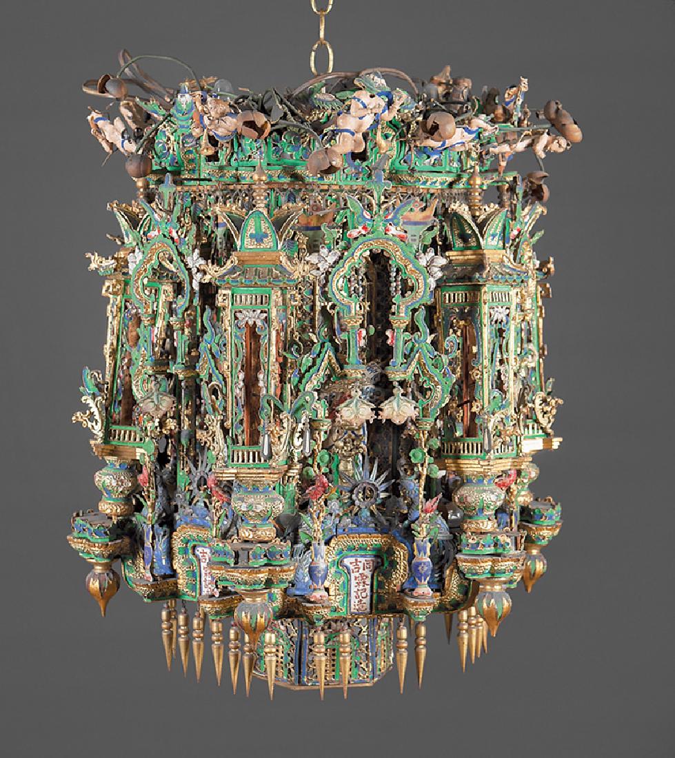 Chinese Enameled Metal Carved Wood Hanging Lantern: Chinese Enameled Metal, Papier-Mâché, Mirror, and Carved Wood Hanging Lantern, late 19th/early 20th c., marked "Tong Ji Ling Ji Zao", shaped roof with musical putti, hexagonal inner structure set wi