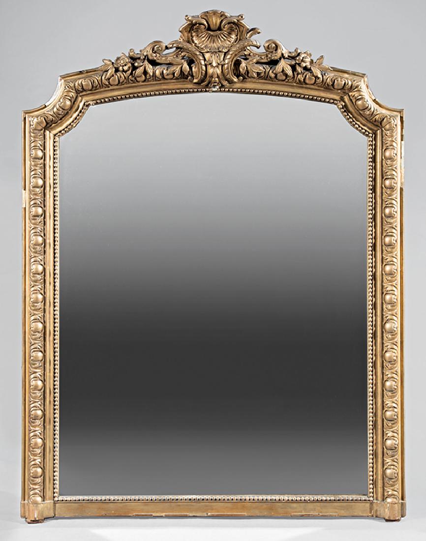French Giltwood Mantel Mirror: Antique French Giltwood Mantel Mirror, 19th c., surmounted by a rocaille crest, foliate and beaded surround, h. 59 in., w. 44 1/2 in