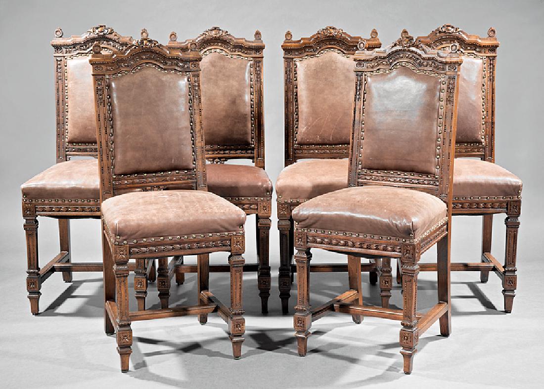 American Belle Epoque Carved Walnut Side Chairs: Set of Six American Belle Epoque Carved Walnut Side Chairs, late 19th c., arched bead and leaf crest rails, padded backs and seats, rosette blocked legs, H stretchers, h. 42 1/2 in., w. 17 1/2 in., d.