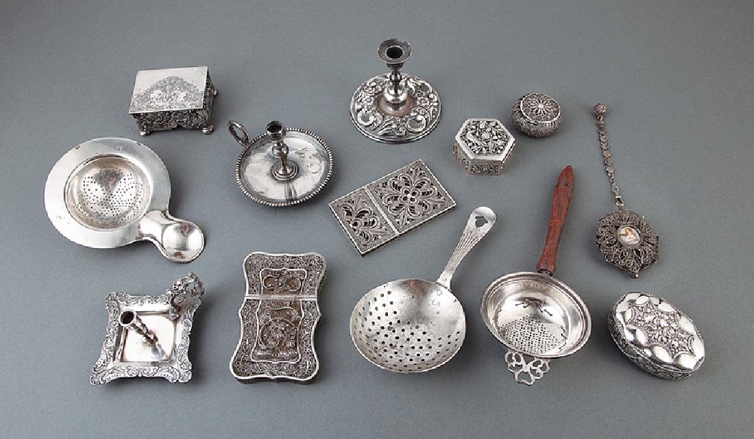 Group of Silver Objects: Group of Antique and Vintage Silver Filigree and Silverplate Objects, incl. 2 filigree card cases, a filigree pill box and a filigree locket; 2 silverplate tapersticks, 1 Tiffany example; 3 silverplat