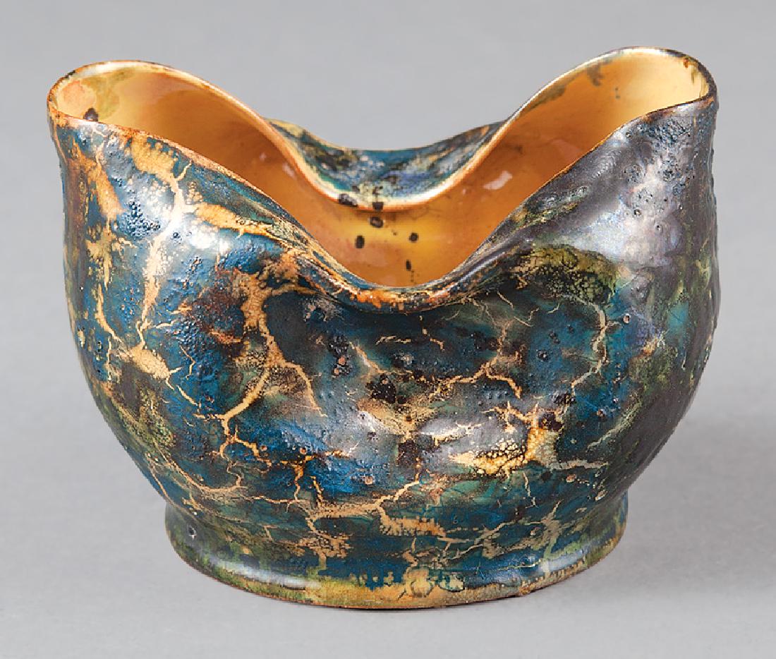 George Ohr Art Pottery Vessel: George Ohr Art Pottery Vessel, c. 1897-1900, crimped form, pinched rim, blue and green crackle glaze, base impressed "G.E. OHR/Biloxi, Miss.", h. 2 1/4 in., w. 3 1/8 in