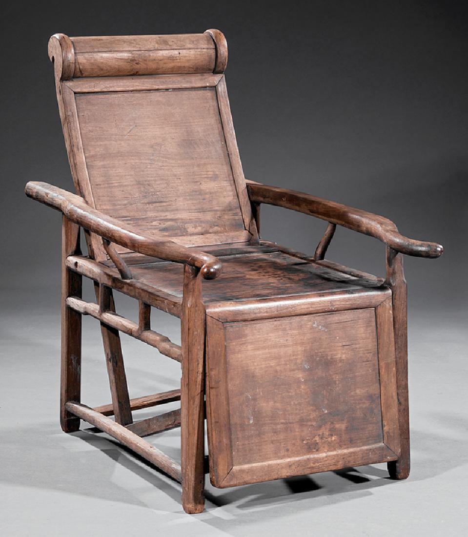Chinese Hardwood Reclining Sedan Chair: Chinese Hardwood Reclining Sedan Chair, 19th c., scrolled crest, paneled back and seat, shaped arms, foot rest, mechanical supports, stretchers, h. 38 in., w. 24 1/2 in., d. (closed) 42 in