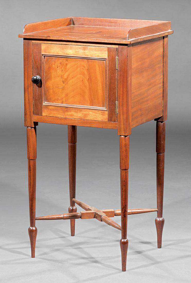 American Federal Walnut Pot Commode: American Federal Walnut Pot Commode, early 19th c., three-quarter gallery, paneled door, tapered turned legs, X stretcher, h. 31 1/4 in., w. 16 in., d. 13 3/4 in