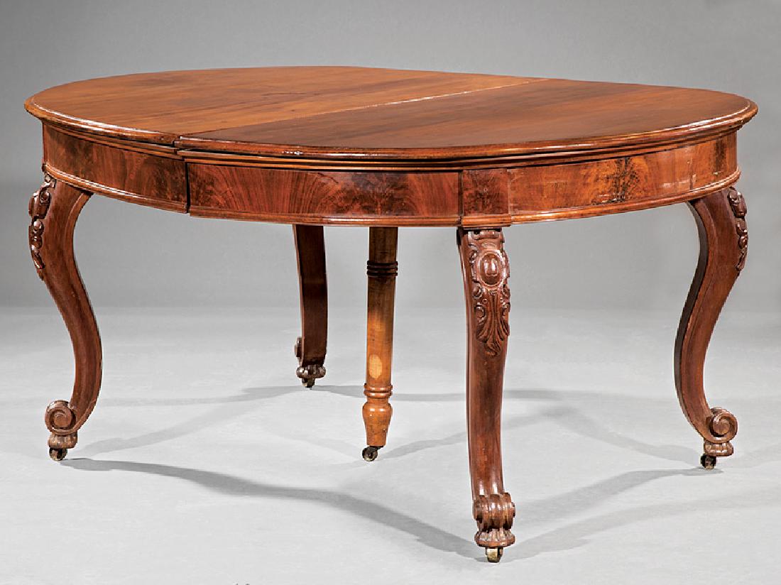 American Rococo Carved Walnut Dining Table: American Rococo Carved Walnut Extension Dining Table, c. 1860-1870, oval top, molded frieze, cabriole legs, scrolled toes, three leaves. Provenance: Trinity Plantation, Rosedale, LA