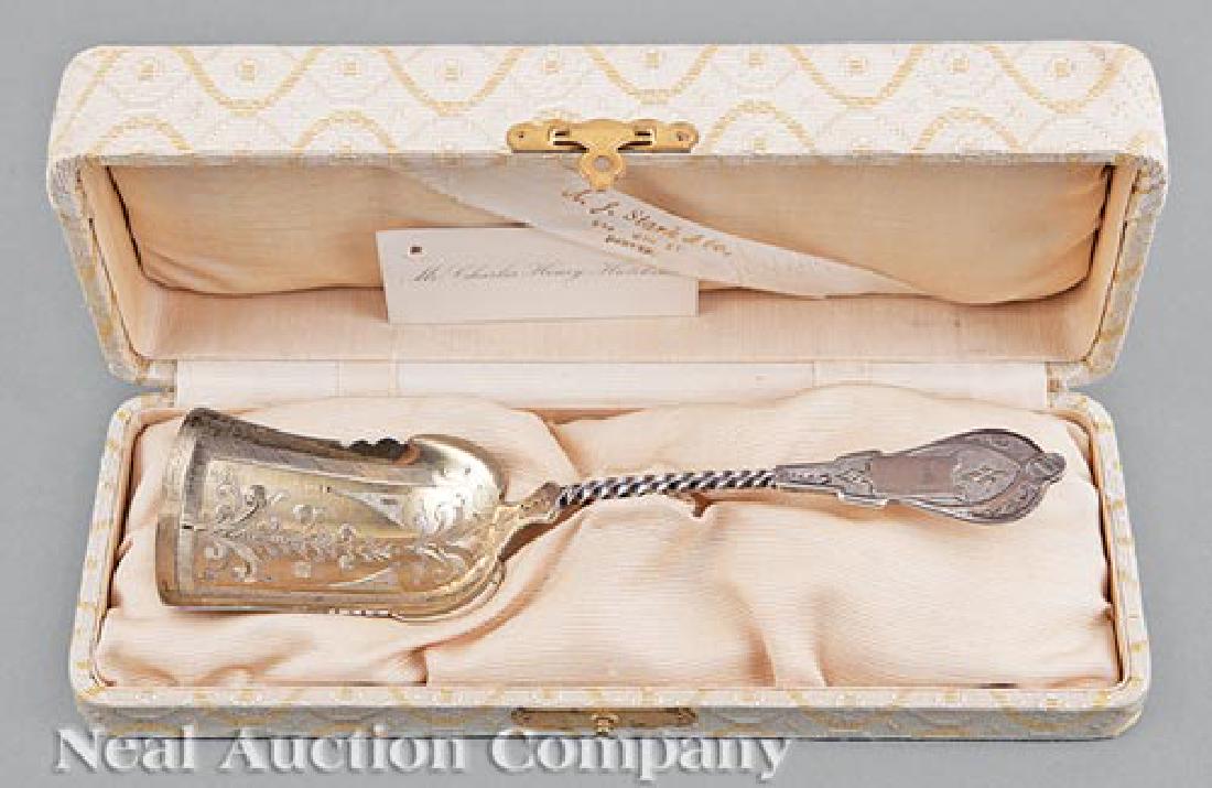 Francis A Bunnell & Co. Coin Silver Berry Scoop: American Coin Silver Berry Scoop in the Aesthetic Taste, Francis A. Bunnell & Co., Syracuse, NY, act. 1866-1874, l. 8 3/4 in., in fitted presentation case labeled "A.J. Stark & Co., 924 16th St., Denv