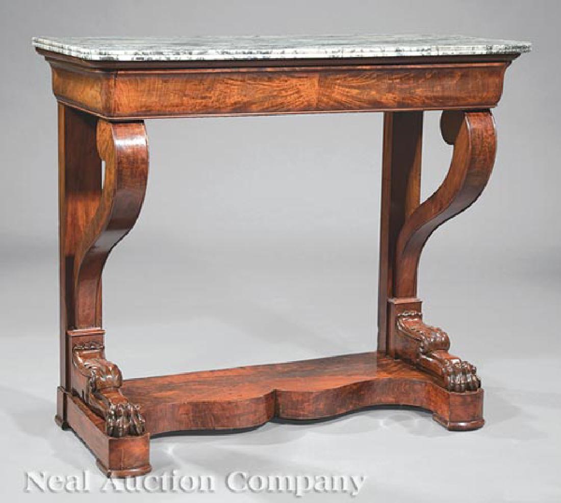 Empire Carved Mahogany Pier Table: Empire Carved Mahogany Pier Table, early 19th c., variegated marble top, ogee frieze fitted with a blind drawer, scrolled supports, acanthine paw feet, incurvate plinth base, h. 37 in., w. 43 1/2 in.,