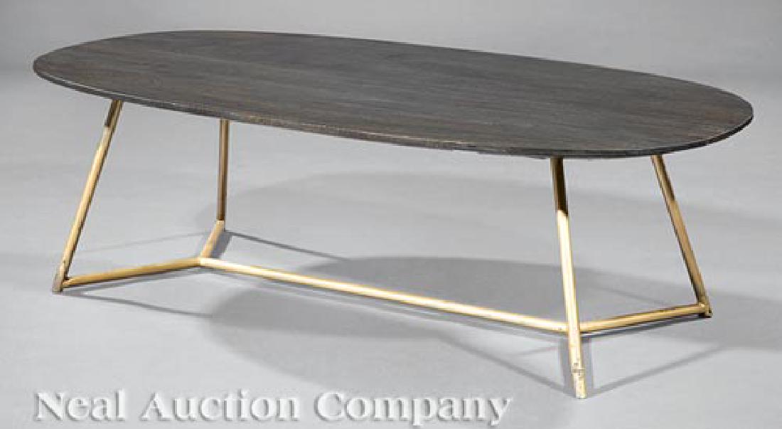 Painted Wood and Enameled Metal Coffee Table: Painted Wood and Enameled Metal Coffee Table, 20th c., oval top, h. 15 in., w. 50 in., d. 25 1/2 in. Ill.: Read, Mimi. "A Historic Greek Revival Residence in New Orleans Is Refreshed to Embody a Sleek