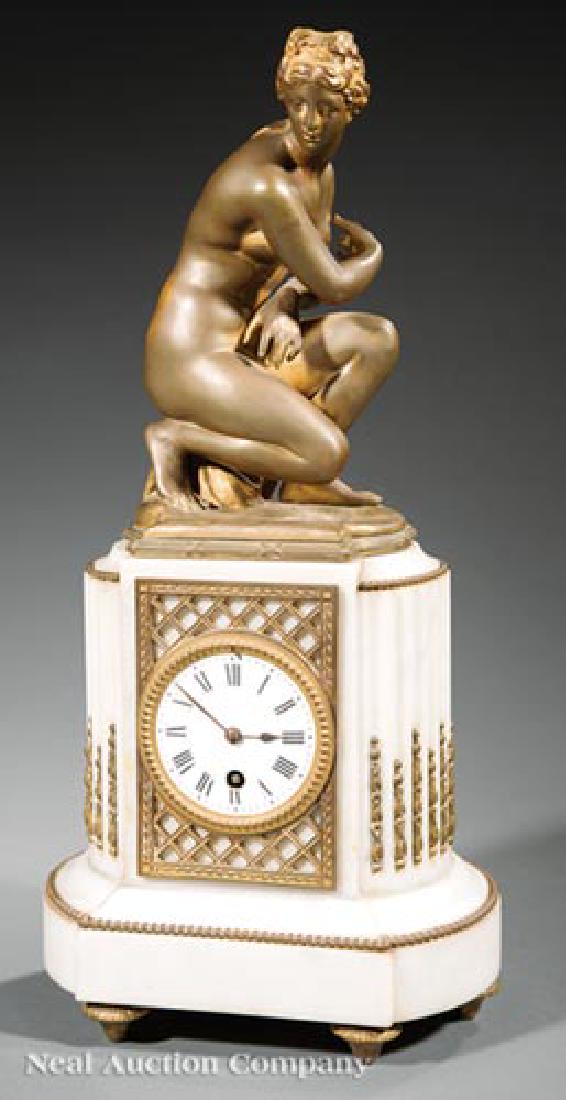Bronze and Marble Figural Mantel Clock: Napoleon III Bronze and Marble Figural Mantel Clock, 19th c., surmounted by figure of the Crouching Venus, fluted columnar case, toupie feet, h. 18 1/2 in., w. 8 3/4 in., d. 6 1/4 in