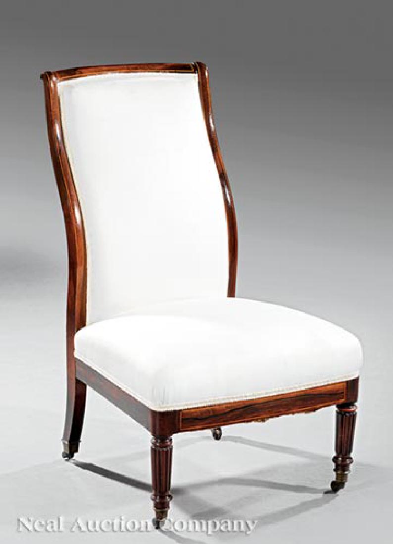 Regency Inlaid Rosewood Slipper Chair: Regency Inlaid Rosewood Slipper Chair, early 19th c., serpentine back, reeded legs, cuff casters, Sotheby's, NY, lot tag, h. 34 in., w. 20 in., d. 20 in