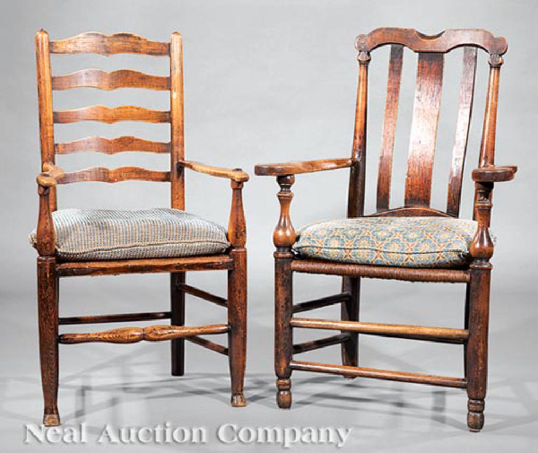 Two English Elm Armchairs: Two English Elm Armchairs, early 19th c., one with shaped slats; the other with yoke crest, both with shaped arms, rush seats, turned legs. Provenance: Henry Stern, New Orleans