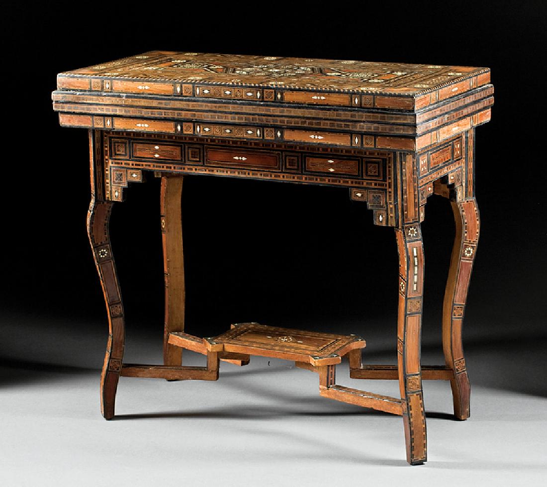 Syrian Exotic Woods Inlaid Games Table: Antique Syrian Mother-of-Pearl and Exotic Woods Inlaid Games Table, c. 1920, foldover top opening to baize gaming surface and fold-out backgammon and chess board, paneled frieze, shaped legs, stretche