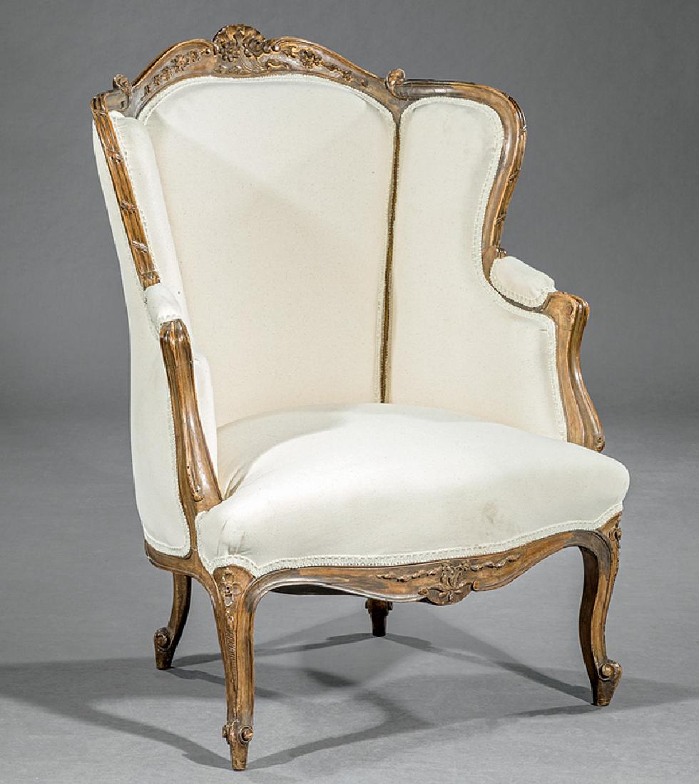 Louis XV-Style Carved and Painted Bergere: Louis XV-Style Carved and Painted Bergere, late 19th c., serpentine floral carved crest rail, shaped wings, padded arms, conforming seat rail, cabriole legs, scrolled toes, h. 40 in., w. 29 1/2 in., d