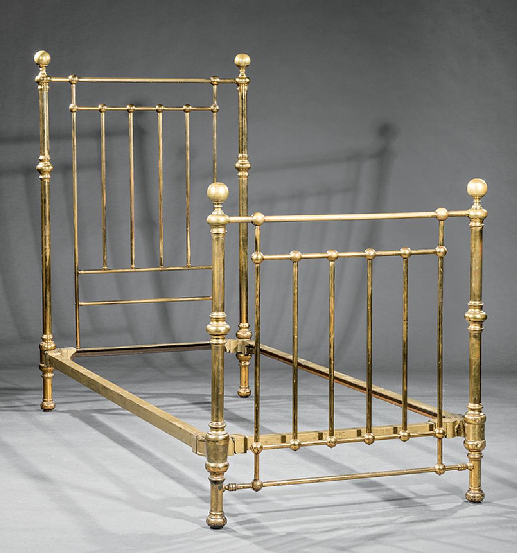 Pair of American Brass Single Beds: Pair of Antique American Brass Single Beds, late 19th c., one labeled "The Ansonia Brass & Copper Co., Ansonia, Conn. U.S.A.", spindled head and foot board, spherical finials, h. 59 1/2 in., l. 76 1/2
