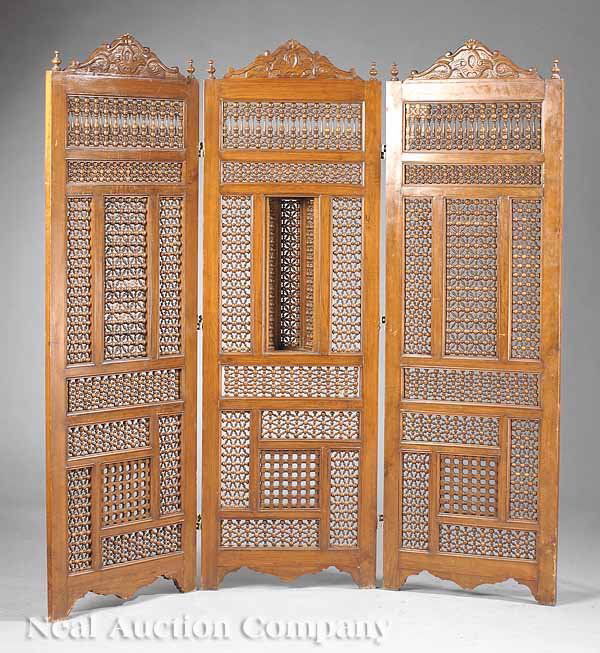 Antique Moorish Spindle and Frame Folding Screen: An Antique Moorish Spindle and Frame Folding Screen , comprising three spindle and frame panels with scrolled crests and a central lantern box, height 71 in., width 69 in., depth 5 in * NO RETURNS ARE