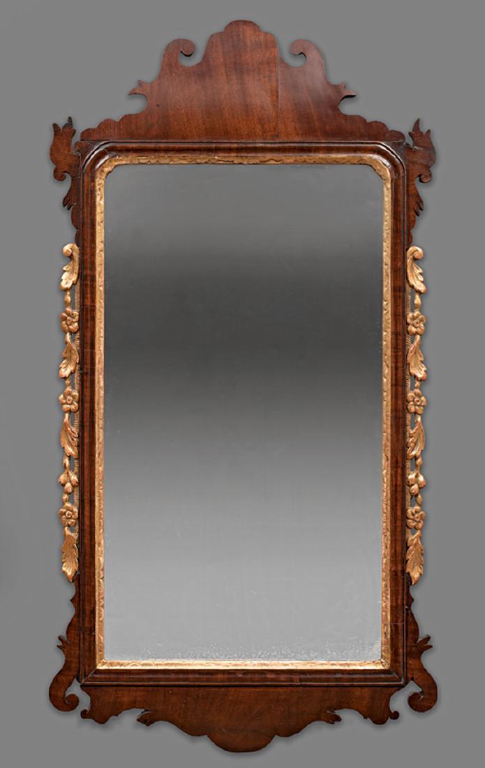 Chippendale Mahogany and Parcel-Gilt Mirror: Chippendale Mahogany and Parcel-Gilt Mirror, 18th c. and later, shaped scrolled crest and base, gilt pendant garland, h. 41 in., w. 22 in