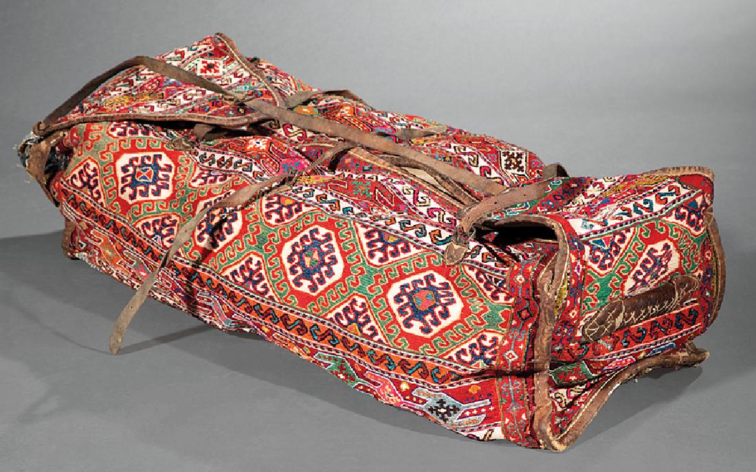 Turkish Camel Bag: Antique Turkish Camel Bag, leather trim, handles and straps, h. 24 in., w. 47 in., d. 24 in. Provenance: Belle Alliance Mansion, Donaldsonville, LA