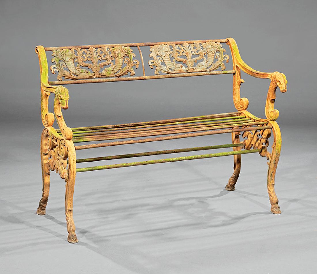 Suite of Cast Iron Garden Furniture: Suite of Antique Cast Iron Garden Furniture, 19th c., after a model by Karl Friedrich Schinkel, incl. settee and 2 armchairs, cornucopia crest rail, rams' head arm terminals and hoof feet, settee h. 2