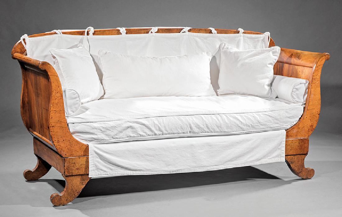Biedermeier Carved Fruitwood Sofa: Biedermeier Carved Fruitwood Sofa, early 19th c., shaped crest rail, scrolled arms, paneled sides, molded seat rail, outswept scrolled legs, h. 39 1/2 in., w. 73 in., d. 27 in