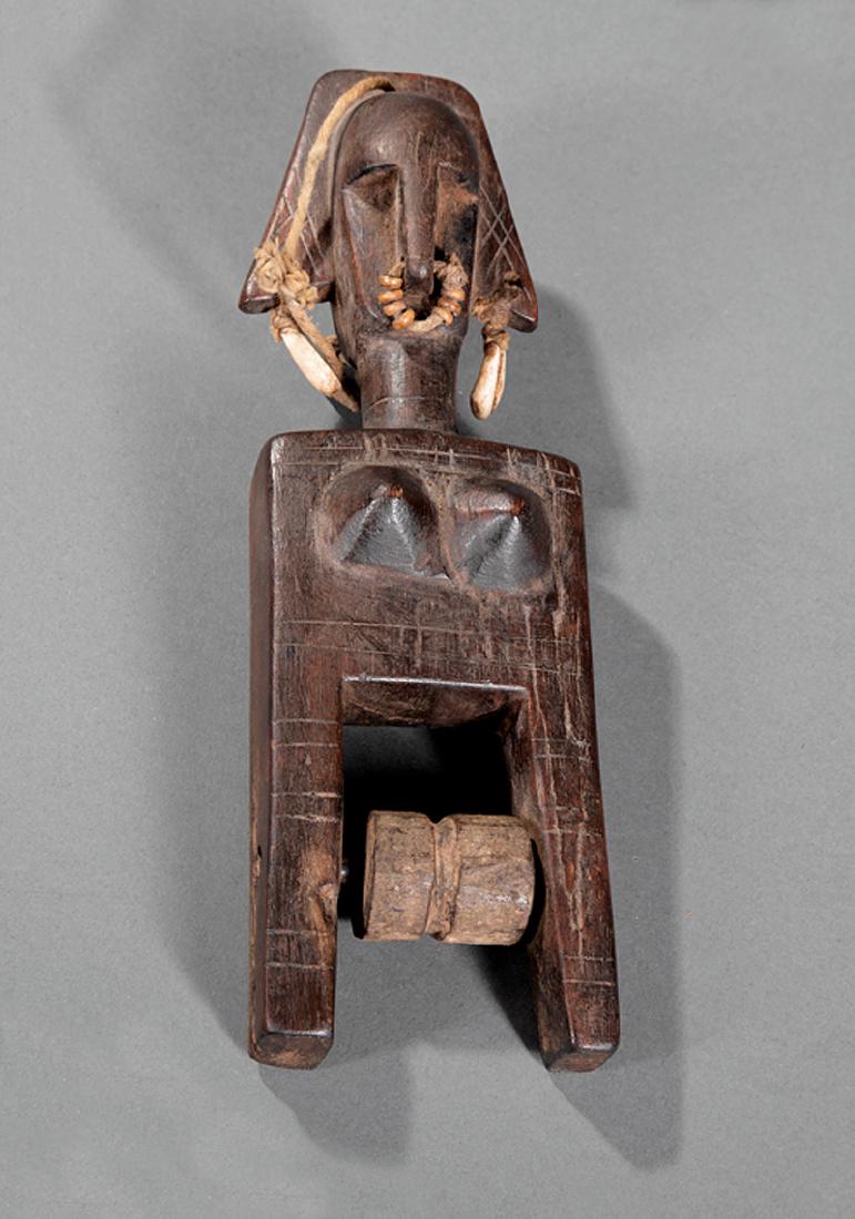 Group of African Weaving Crafts: Group of African Weaving Crafts, incl. probably Guro, Ivory Coast, carved wood heddle pulley, h. 8 1/2 in, w. 2 5/8 in., d. 2 1/4 in.; three textiles incl. Nigerian or Republic of Benin, dyed cotton a