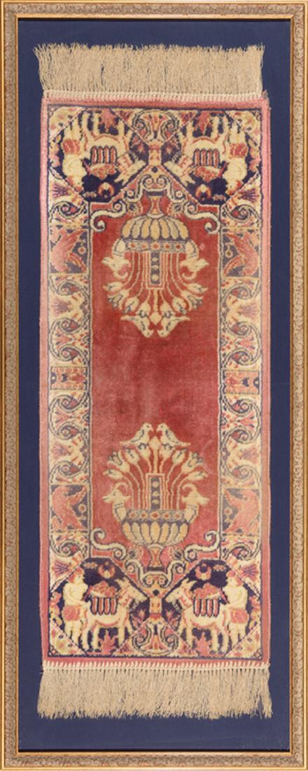 Antique Diminutive Persian Silk Rug: Antique Diminutive Persian Silk Rug, red ground, with designs of vases, figures, horses and birds, 13 in. x 39 in., fringe, framed, overall h. 18 in., w. 44 in. Provenance: Property of the Mobile Muse
