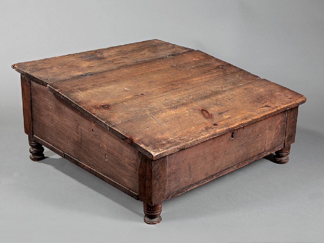 American Carved Pine Lap Desk: American Carved Pine Lap Desk, early 19th c., strapwork hinged lid, deep interior compartment, blocked corners, turned feet, h. 11 1/2 in., w. 23 3/4 in., d. 26 in. Provenance: Property of the Mobile 