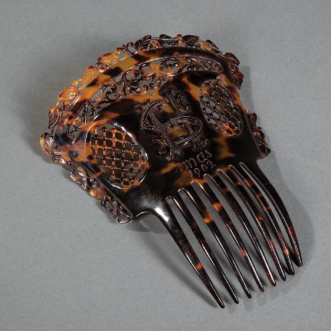 Large Tortoiseshell Hair Comb: Large Tortoiseshell Hair Comb, c. 1902, with entwined "SH" monogram above incised "XMas / 1902", flanked by reticulated panels, h. 7 in., w. 5 1/2 in.. Provenance: Property of the Mobile Museum of Art