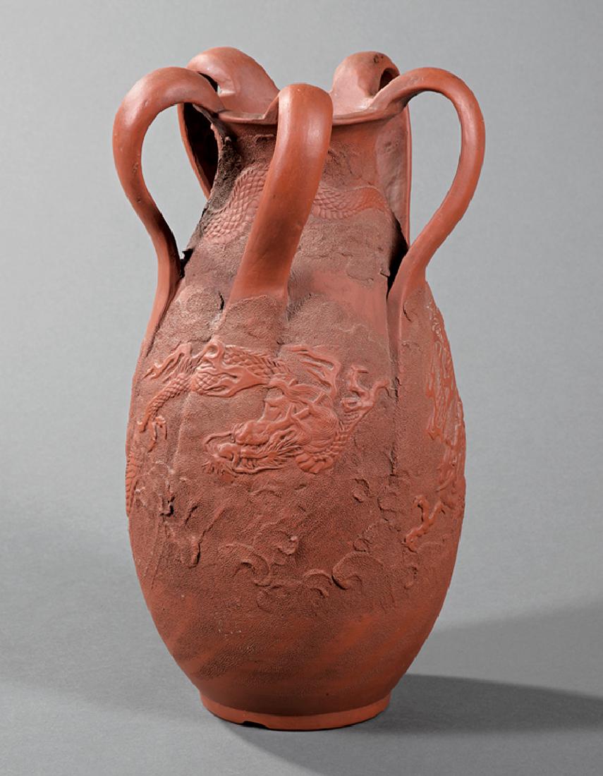 Japanese Tokoname Pottery Vase: Japanese Tokoname Pottery Vase, Meiji Period (1868-1912), five loop handles, ovoid body molded with dragons amid clouds, h. 14 1/4 in. Provenance: Property of the Mobile Museum of Art, Mobile, AL, acq