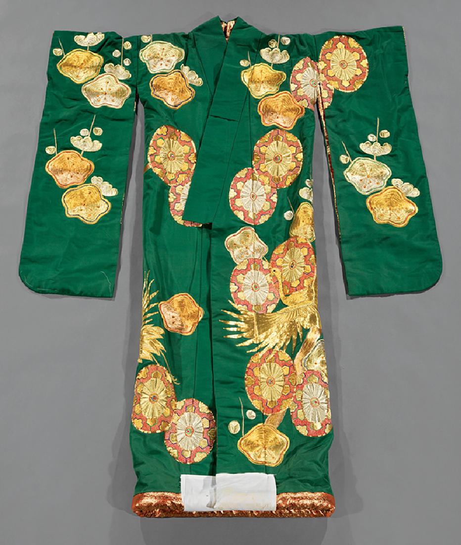 Japanese Embroidered Silk Furisode Kimono: Japanese Embroidered Silk Furisode Kimono, 20th c., worked in polychrome and couched metallic threads with phoenix birds amid stylized plants and flowers, l. (approx.) 71 in. Provenance: Property of t