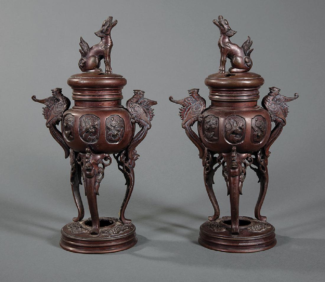 Pair of Japanese Patinated Metal Tripod Censers: Pair of Japanese Patinated Metal Tripod Censers/Koros, Meiji/Taisho, 20th c., kirin finials, phoenix handles, phoenix mask legs, h. 12 5/8 in. Provenance: Property of the Mobile Museum of Art, Mobile,