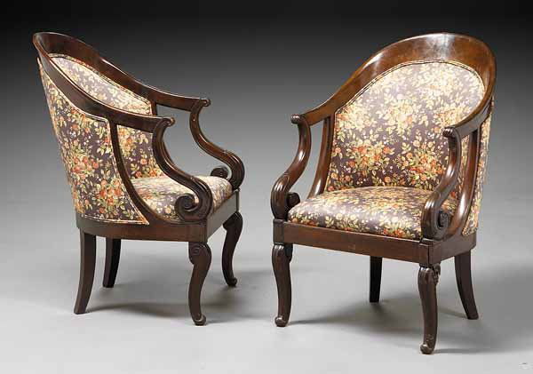Pair of Restauration Mahogany Chaises en Gondole: A Good Pair of Restauration Mahogany Chaises en Gondole , c. 1830, with s-scroll arm supports and carved sabre front legs * NO RETURNS ARE ACCEPTED ON THE BASIS OF CONDITION * PLEASE READ ALL CONDITIO