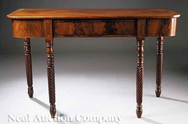 Antique Regency Style Inlaid Mahogany Side Table: An Antique Regency Style Inlaid Mahogany Side Table , the D end top over a blocked apron with center drawer, spiral reeded legs on turnip feet, height 35 in., width 56 in., depth 32 in * NO RETURNS AR