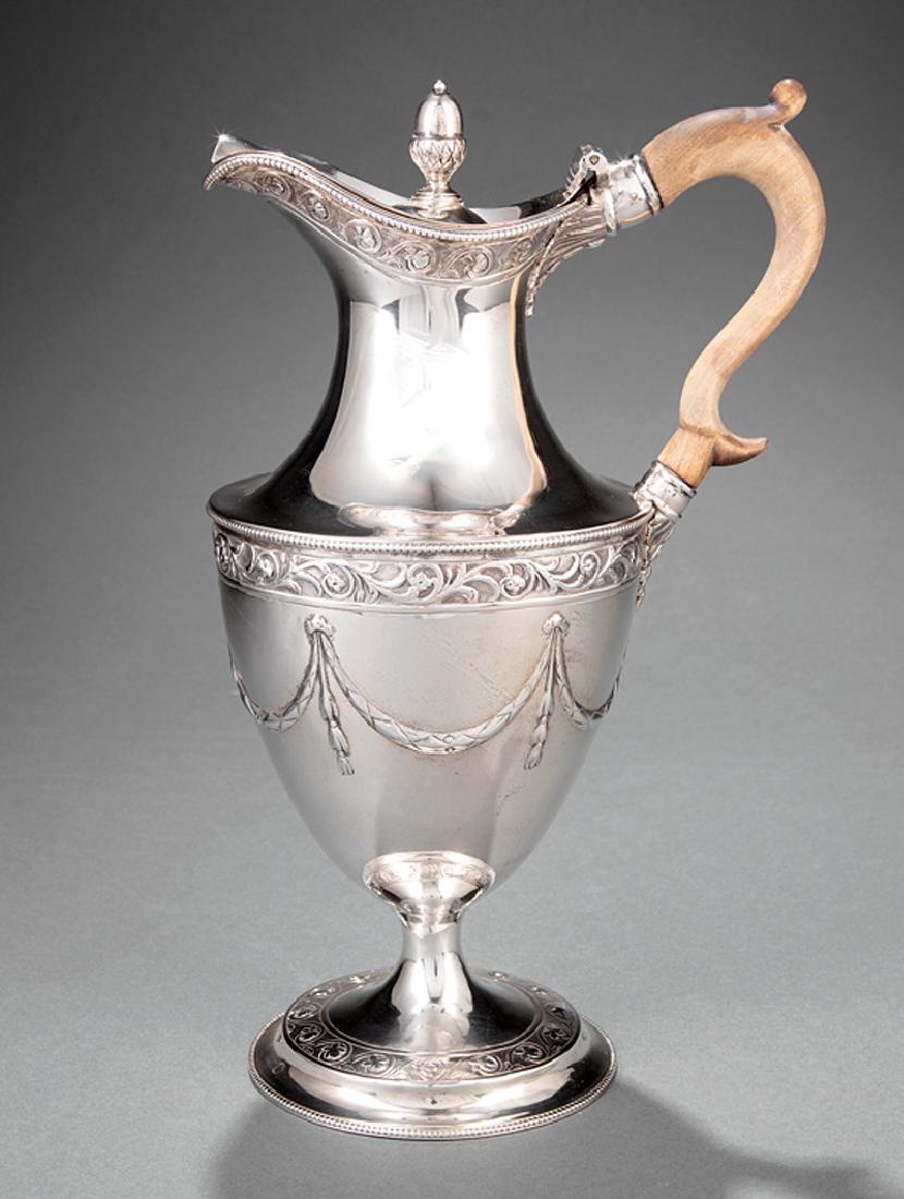 Joseph Jackson Sterling Silver Hot Water Jug: Irish George III Sterling Silver Hot Water Jug, Joseph Jackson, Dublin, 1782, hinged cover with acorn finial, chased floral scrollwork, drapery swags, engraved crest, h. 12 1/2 in., wt. 24.90 troy ozs