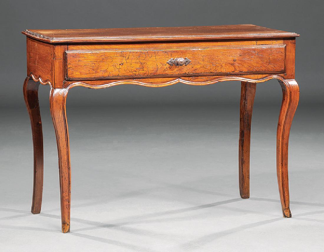 French Provincial Carved Walnut Table: French Provincial Carved Walnut "Pied de Biche" Table, early 19th c., frieze drawer, serpentine apron, cabriole legs, hoof feet, h. 24 in., w. 32 1/2 in., d. 16 in