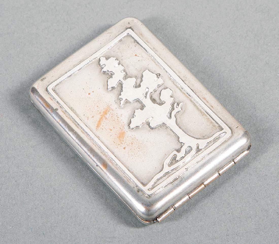 Newcomb College Sterling Silver Matchbox Holder: Newcomb College Hand-Wrought Sterling Silver Matchbox Holder, c. 1920-30, artist unknown, rectangular with a molded border and decorated with a cypress tree, h. 2 1/2 in., w. 1 3/4 in., d. 1/2 in. Pro